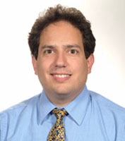 John Koutras, M.D.